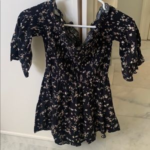 Floral black romper, size small